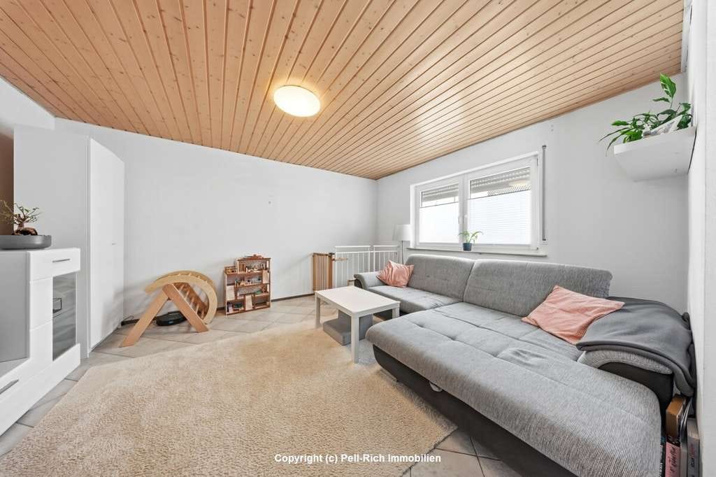 Immobilie in Rülzheim - LIEBLINGSORT: Gemütliche 3,5-Zimmer-Wohnung mit Hobbyraum und eigenem Garten in Rülzheim zum Kauf - Bild 2