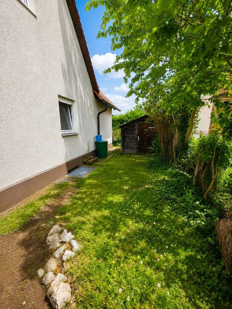 Immobilie in Wendelstein - Einfamilienhaus mit Potenzial auf schönem Grundstück in Wendelstein-Röthenbach bei St. Wolfgang - Bild 2