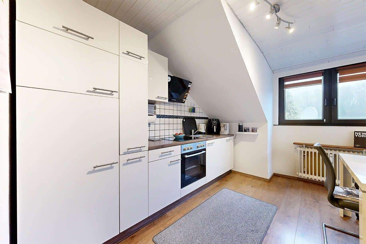Immobilie in Übach-Palenberg - PHI AACHEN - Solides 3-Familienhaus mit Garage und Stellplatz in ruhiger Lage von Übach-Palenberg! - Bild 3