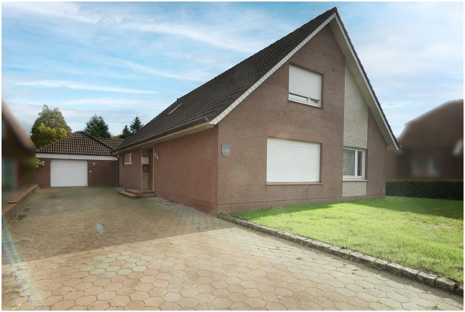 Immobilie in Ostrhauderfehn - ***NEUER KAUFPREIS*** Einfamilienhaus mit Einliegerwohnung in zentraler Lage von Ostrhauderfehn - Bild 0