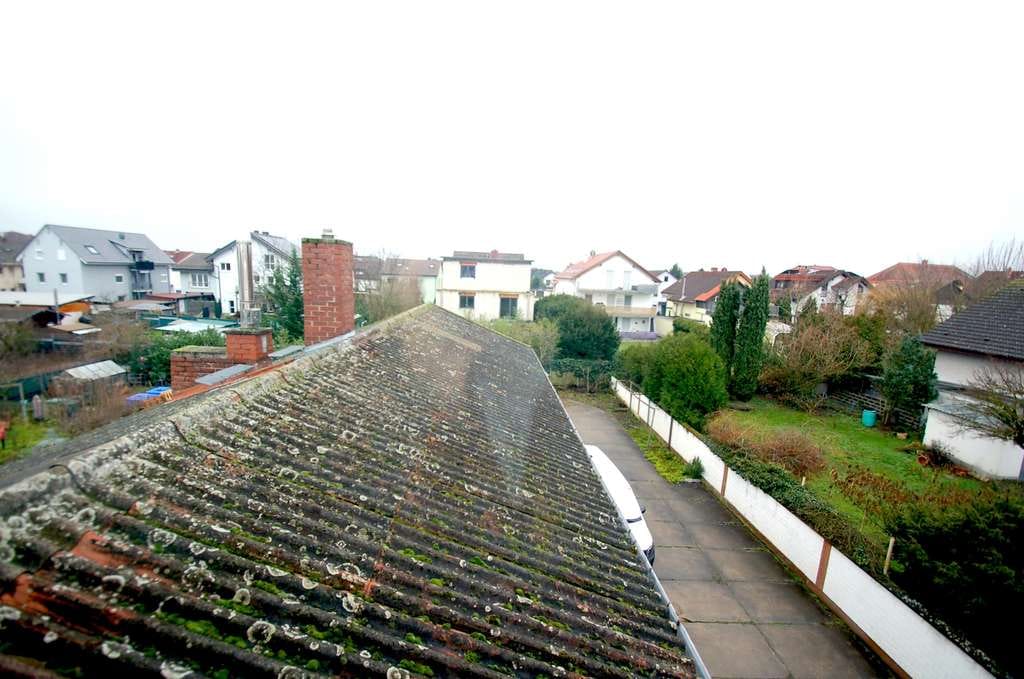 Immobilie in Bürstadt - Mehrfamilienhaus mit Ladengeschäft in ruhiger und beliebter Lage - Bild 4