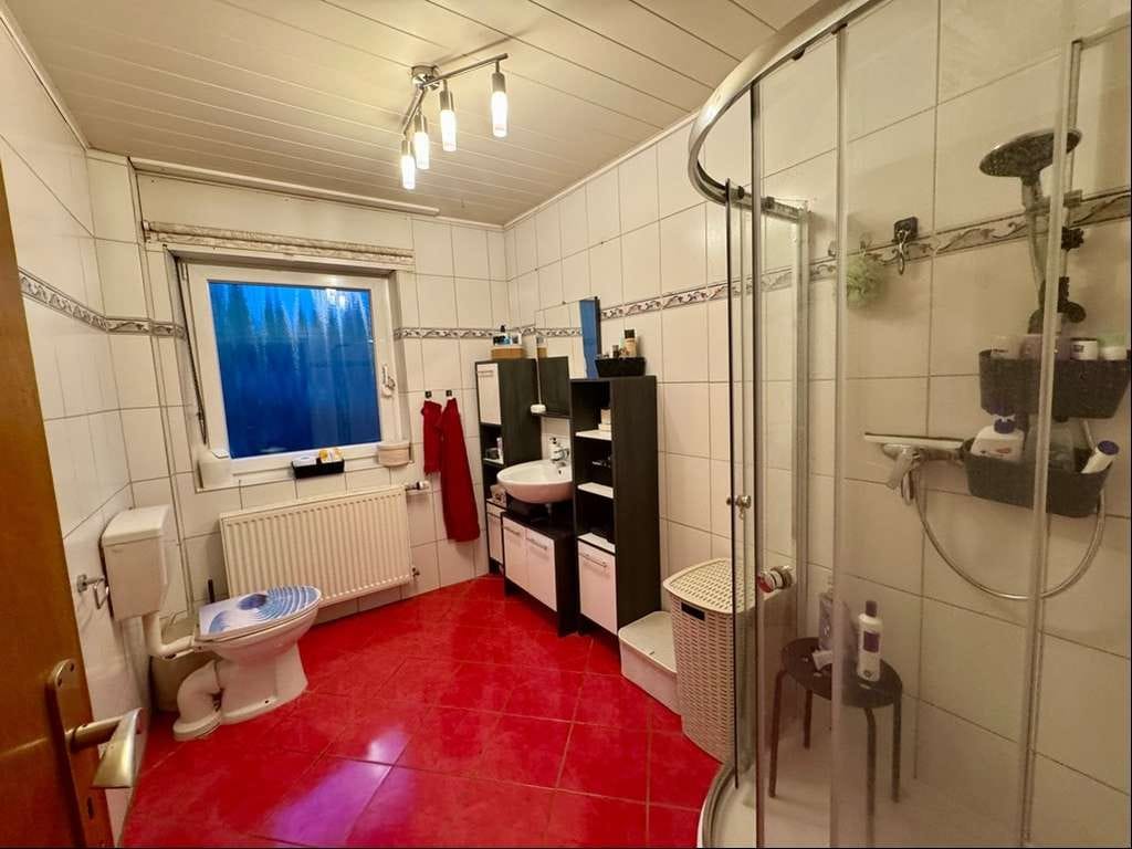 Immobilie in Neunkirchen - Vermietetes Zweifamilienhaus mit 5 Garagen  - Bild 4