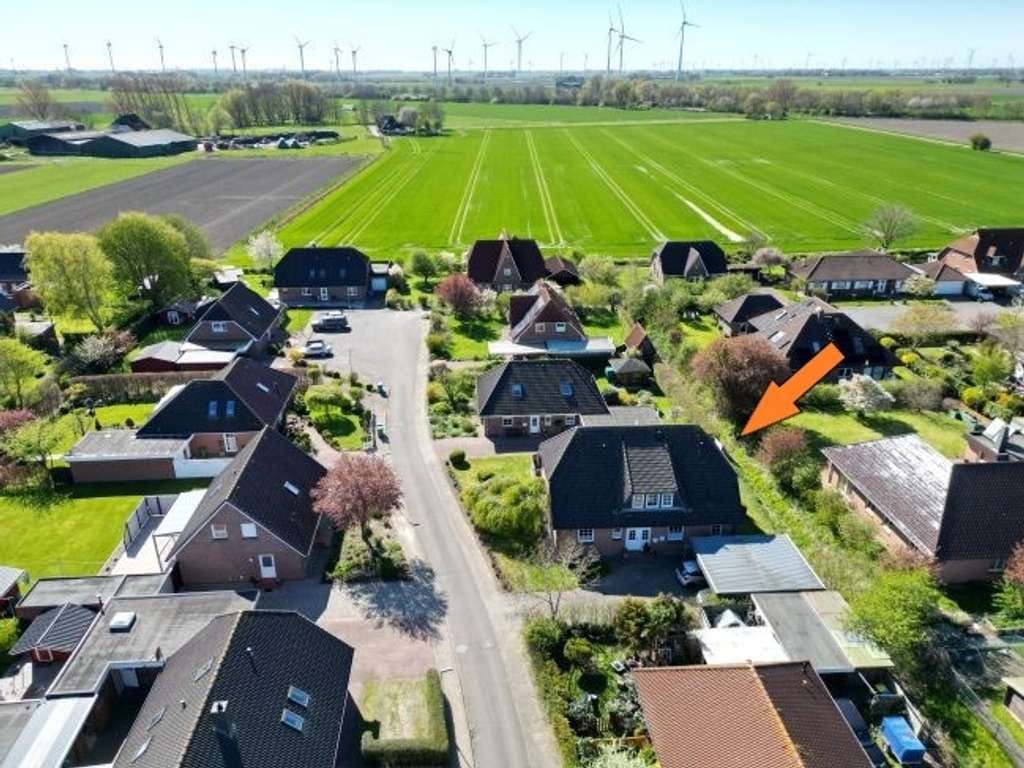 Immobilie in Wöhrden - Vermietetes, 1993 massiv erbautes Zweifamilienhaus mit Doppelcarport bei Büsum - Bild 1