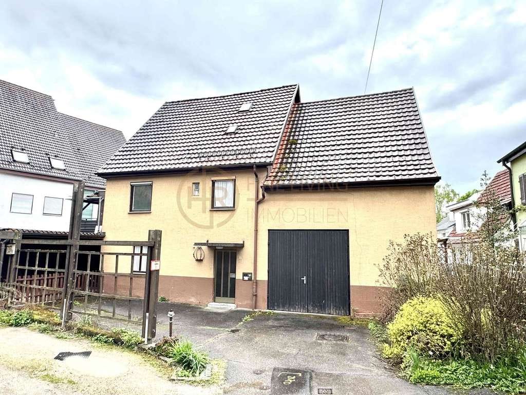 Immobilie in Ostfildern - Sanierungsbedürftiges Einfamilienhaus im Zentrum von Ostfildern-Nellingen - Bild 0