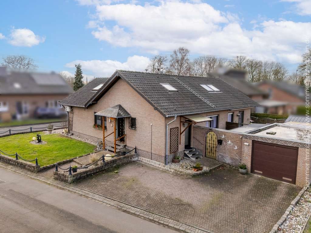 Immobilie in Kalkar - Freistehendes Einfamilienhaus mit separater Einliegerwohnung - Bild 1